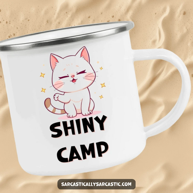 Funny camping mug with a mischievous cat winking and juggling sparkly objects, perfect for outdoor fun.