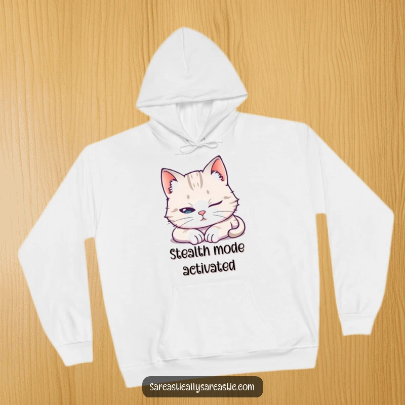 Funny Hoodie featuring a cat pretending to sleep with one eye open, offering warm, humorous loungewear for feline enthusiasts.