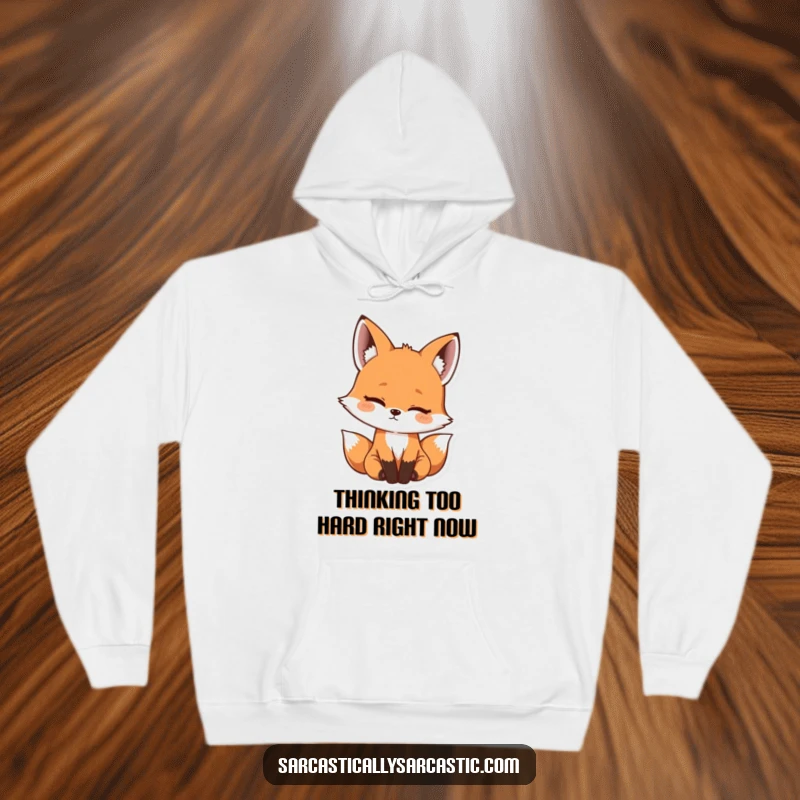 Funny kawaii fox hoodie showing a cute head tilt with a hint of amusement, perfect for a warm and funny gift.