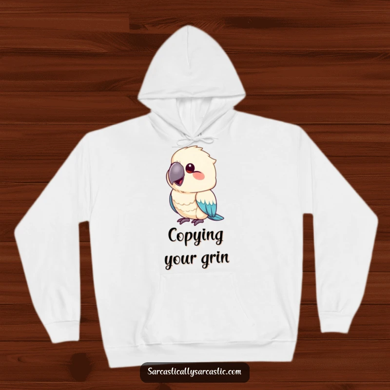 Funny hoodie showcasing a parrot mimicking a smirk with its beak slightly upturned, perfect for cozy, sassy moments.