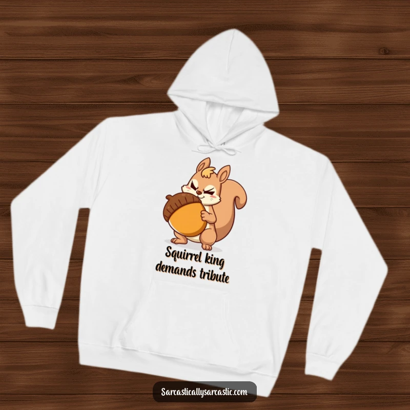Funny Hoodie: Sarcastic squirrel in a cozy hoodie, smirking as it holds a giant acorn, a humorous depiction of preparedness.