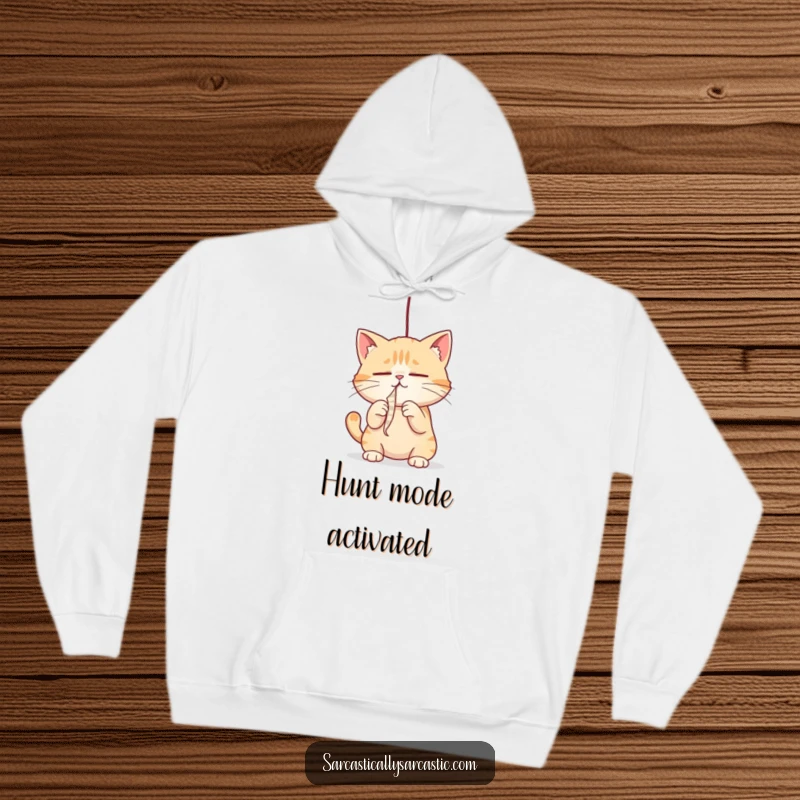 Funny cat hoodie with a cat playfully batting a dangling string, perfect for cozy comfort and a funny gift.